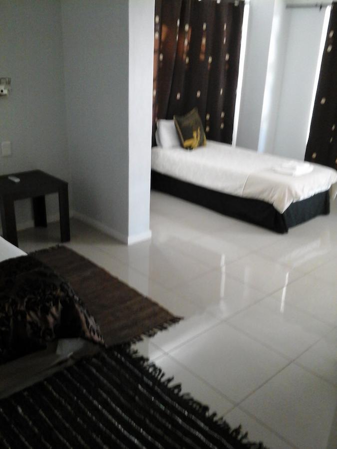 Village Boutique Hotel أوتجيوارونغو الغرفة الصورة